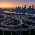 Modern highway interchange at sunset, symbolizing infrastructure investment